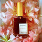 signature botanical perfume in clear square atomizer with gold top, on a pillow of flowers "Esther" 